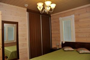 Кровать или кровати в номере Ylijarvi cottages