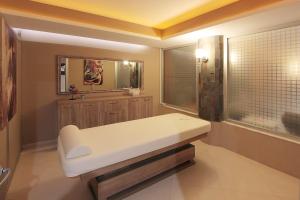 Postel nebo postele na pokoji v ubytování Forum Suite Otel