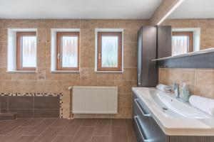 Koupelna v ubytování Ferienhaus La Paloma + 44 fotografií