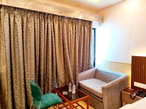 Posezení v ubytování A LUXUARY HOTEL DREAM!LAND Near Sea Beach And Jagannth Temple - Fully Air Conditioning Luxuary Rooms - Lift - Restaurant & Parking Facilities - Four Star Hotel In Puri