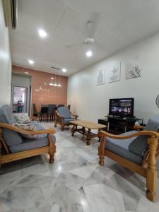 Μια τηλεόραση ή/και κέντρο ψυχαγωγίας στο Garden Homes Simple Seremban 2