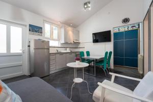 Kuchyň nebo kuchyňský kout v ubytování Grifon 72 Apartments + 20 fotografií