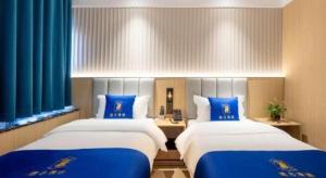 Super 8 Hotel Beijing South Railway Station Majiabao Metro Station客房内的一张或多张床位
