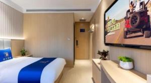 Super 8 Hotel Beijing South Railway Station Majiabao Metro Station客房内的一张或多张床位