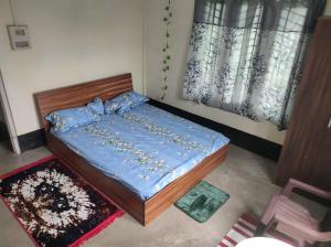 Postel nebo postele na pokoji v ubytování J10 Homestay