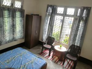 Postel nebo postele na pokoji v ubytování J10 Homestay