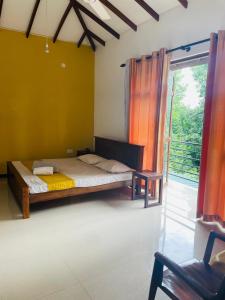 Giường trong phòng chung tại Namal Residence & Restaurant