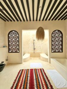 Koupelna v ubytování Tulia House Lamu