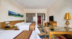 TV a/nebo společenská místnost v ubytování Vienna Hotel Guangdong Zhuhai Mingzhu Station Guozheng