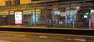 a subway station at night with a glass wall at Casa de don Angel in Las Victorias