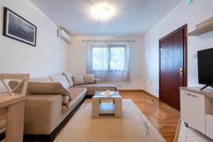 TV a/nebo společenská místnost v ubytování Hera City Apartment