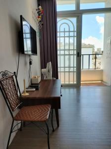Sjónvarps- og/eða afþreyingartæki á Kenting Cozy B&B