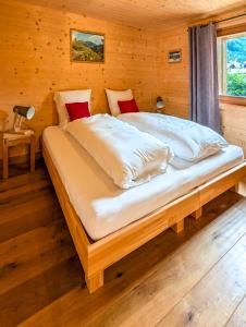 Vuode tai vuoteita majoituspaikassa Luxueux Chalet au centre de Champéry vue panoramique