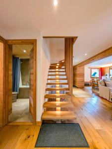 Vuode tai vuoteita majoituspaikassa Luxueux Chalet au centre de Champéry vue panoramique