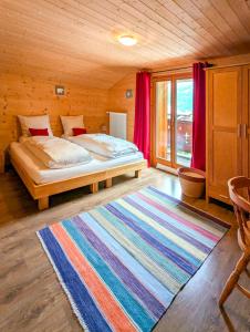 Vuode tai vuoteita majoituspaikassa Luxueux Chalet au centre de Champéry vue panoramique