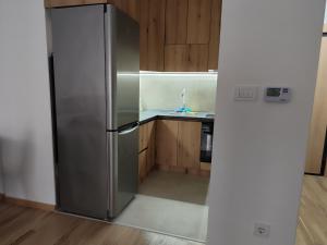 Kuchyň nebo kuchyňský kout v ubytování Apartment Sandra