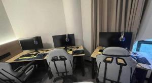 TV o dispositivi per l'intrattenimento presso GreenTree Inn Shanghai MinHang ZhuanQiao Subway Station East ZhuanXing Road Shell Hotel