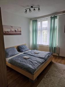 Postel nebo postele na pokoji v ubytování Apartman Sara