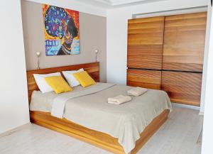 a bedroom with a bed with two towels on it at Edelweiss Success Home Beach in Iskele +53 photos