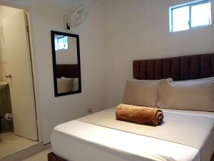 Letto o letti in una camera di Hotel Aerocafe Pereira