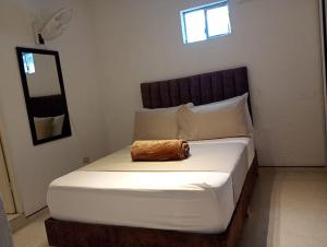 Letto o letti in una camera di Hotel Aerocafe Pereira