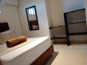 Letto o letti in una camera di Hotel Aerocafe Pereira