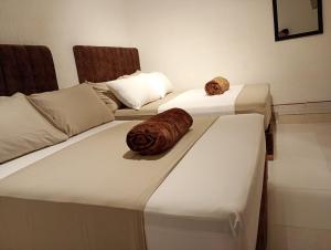 Letto o letti in una camera di Hotel Aerocafe Pereira
