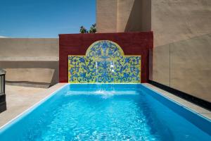 Πισίνα στο ή κοντά στο Casa Palacio Moratín by Magno Apartments