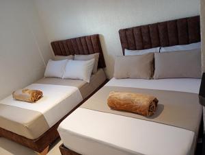 Letto o letti in una camera di Hotel Aerocafe Pereira