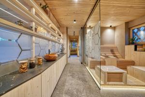Kuchyň nebo kuchyňský kout v ubytování Eco Bnb & Apartments Bründlerhof