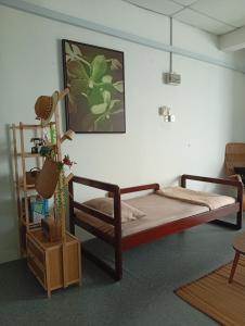 Ένα ή περισσότερα κρεβάτια σε δωμάτιο στο Bajet Homestay - Teratak Singgah