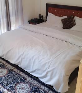 Postel nebo postele na pokoji v ubytování Kempty Lake Resort