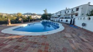Bazén v ubytovaní Apartamento en Urbanizacíon Residencial alebo v jeho blízkosti