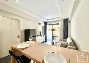 Posezení v ubytování Sunset Apt moderne à 2 min de la plage, clim, piscine