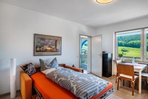Postel nebo postele na pokoji v ubytování Ferienwohnung Kuckuckslockennest