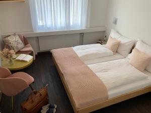 Hotel B&B Stossplatz客房内的一张或多张床位
