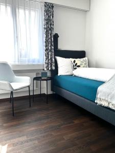 Hotel B&B Stossplatz客房内的一张或多张床位