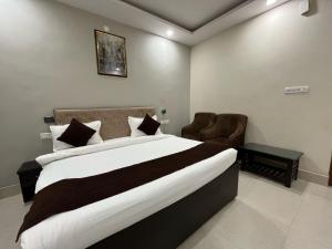 Giường trong phòng chung tại Hotel GLS International