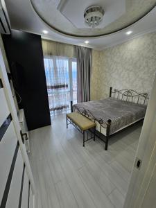 Ένα ή περισσότερα κρεβάτια σε δωμάτιο στο Ruslanas appartament
