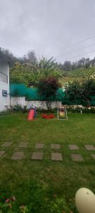 Magizham Homestay外面的花园