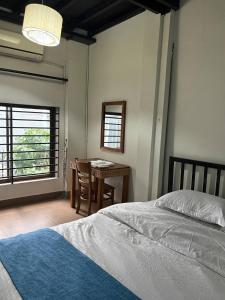 Postel nebo postele na pokoji v ubytování Hostel FUJI