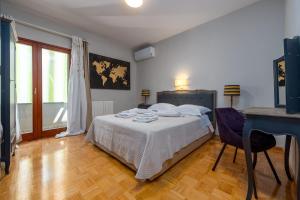 Posteľ alebo postele v izbe v ubytovaní Villa Antea ZadarVillas