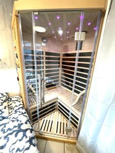 Postel nebo postele na pokoji v ubytování La détente avec jardin, sauna et parking privé au coeur de Stella-Plage + 11 fotografií