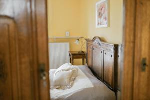 Postel nebo postele na pokoji v ubytování Apartamenty Optimal