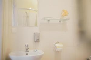 Koupelna v ubytování Apartamenty Optimal