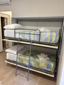 Postel nebo postele na pokoji v ubytování Appartamento Scilla centro