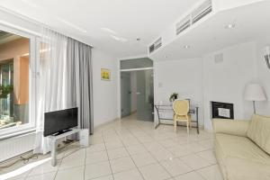 TV a/nebo společenská místnost v ubytování Hotel Schild