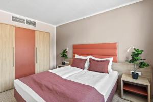 Postel nebo postele na pokoji v ubytování Hotel Schild