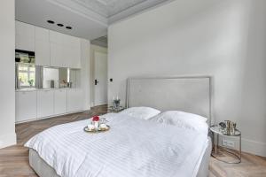 Posteľ alebo postele v izbe v ubytovaní Apartamenty Gdańsk Piwna