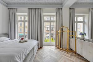 Posteľ alebo postele v izbe v ubytovaní Apartamenty Gdańsk Piwna